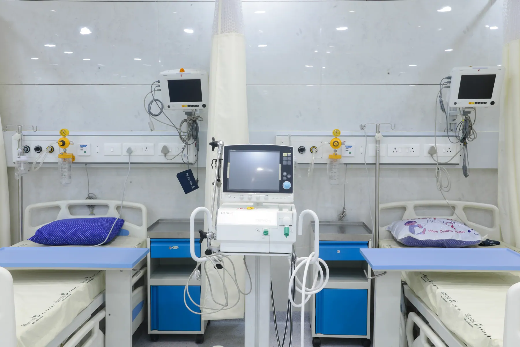 Critical care bedside with monitors and ventilator
