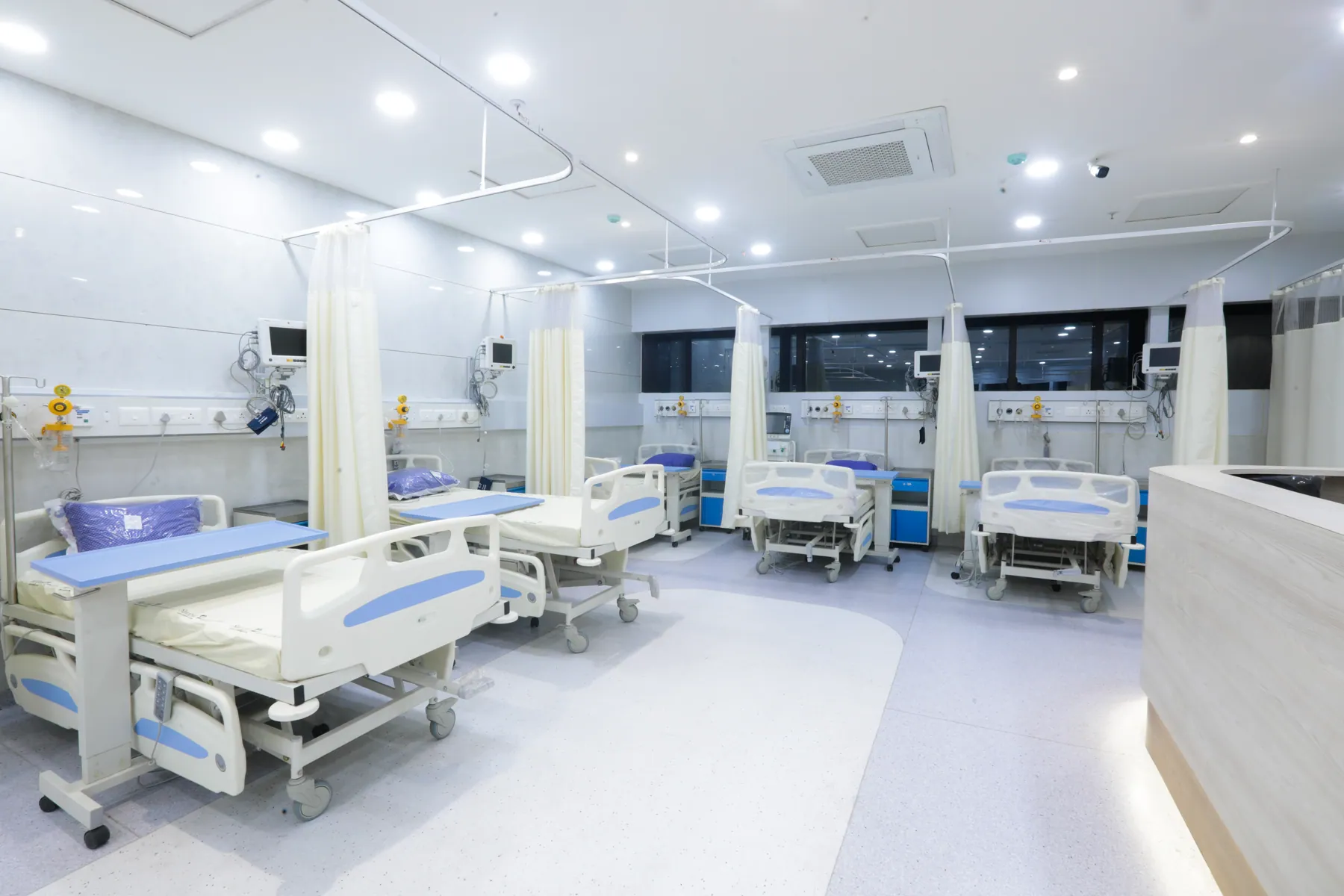 Multi-bed ward seen from the nursing station